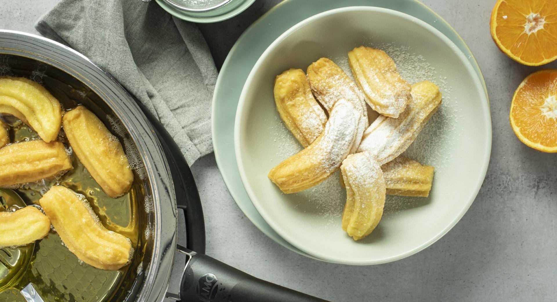 Churros con naranja