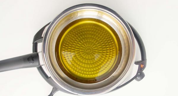 Colocar la sartén con el aceite en frío en el Navigenio a temperatura máxima (nivel 6). Encender el Avisador (Audiotherm), colocarlo en el pomo (Visiotherm) y girar hasta que se muestre el símbolo de “chuleta”.