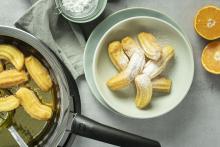 Churros con naranja